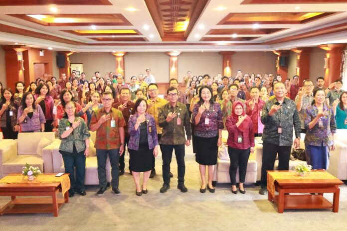 Pelaksanaan kegiatan sosialisasi perlindungan K3 yang berlangsung di Gedung Sewaka Dharma, Lumintang